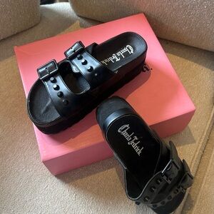 Black platform studded sandals by Charla Tedrick